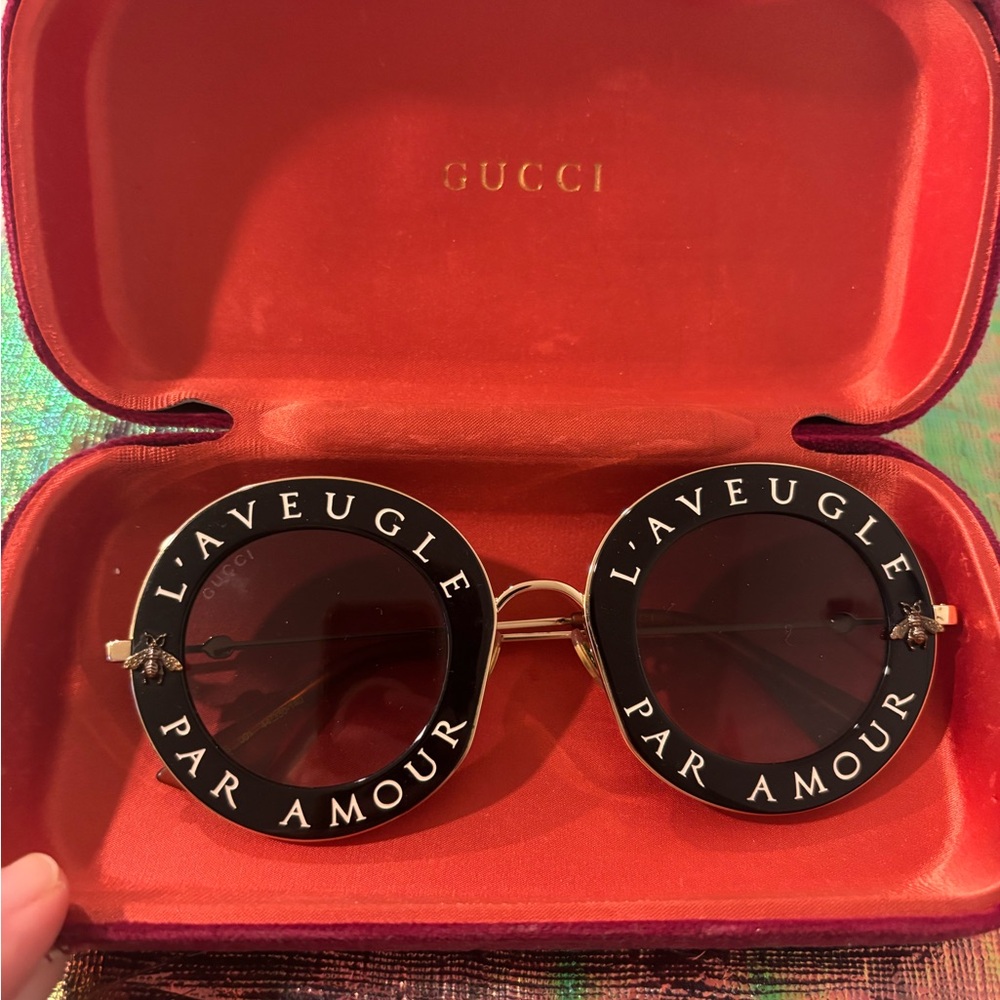 Gucci Black Round Sunglasses with Gold Accents “Mon amour laveugle”
